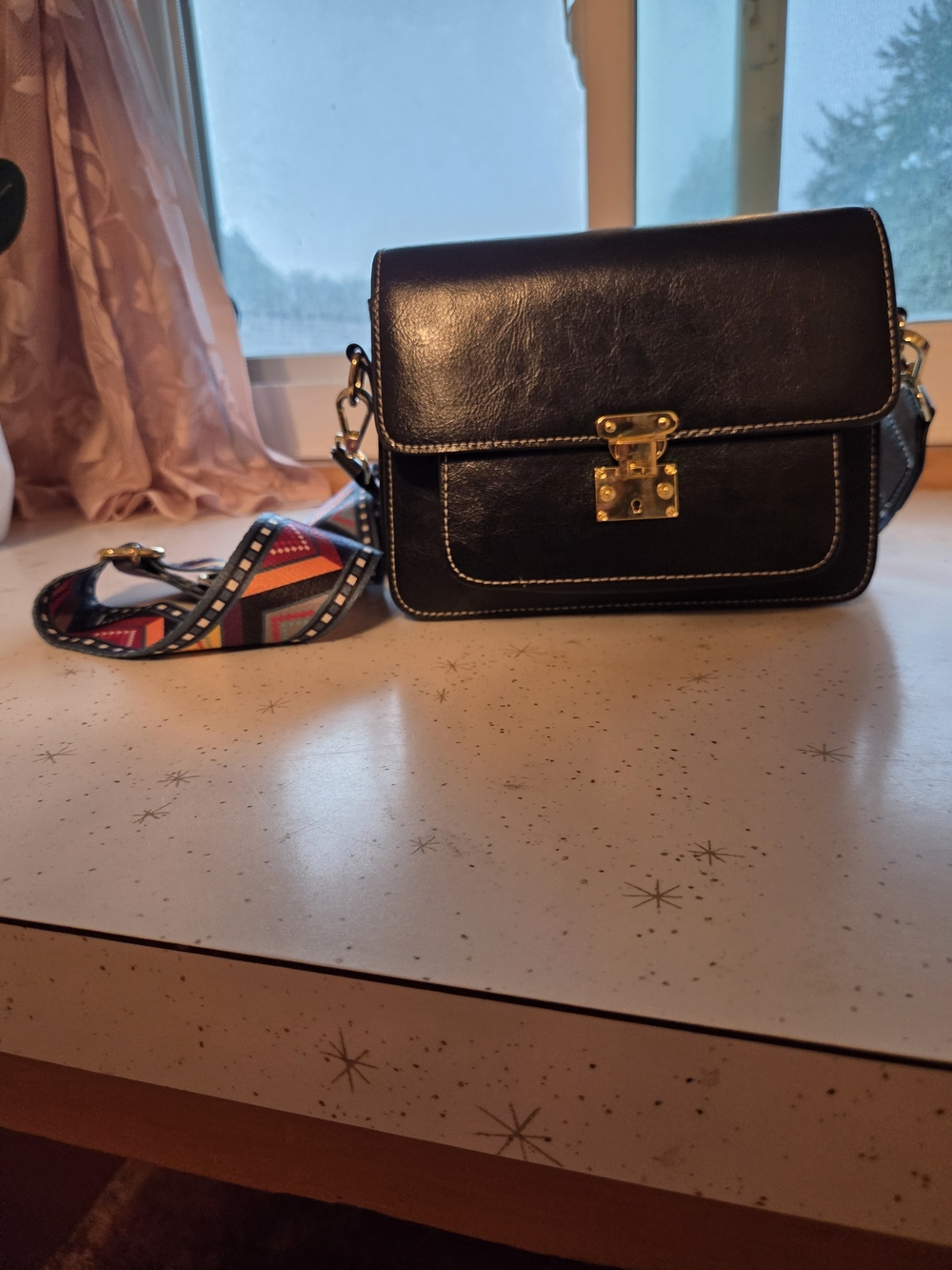 Classic Black Crossbody Bag with Gold Hardware